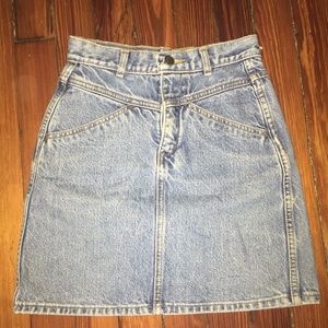 High waisted light wash denim mini skirt.
